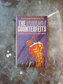 The Counterfeits - Leo F. Kelley