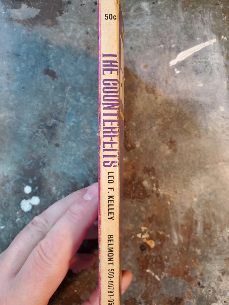 The Counterfeits - Leo F. Kelley