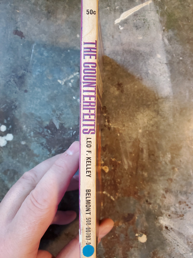 The Counterfeits - Leo F. Kelley