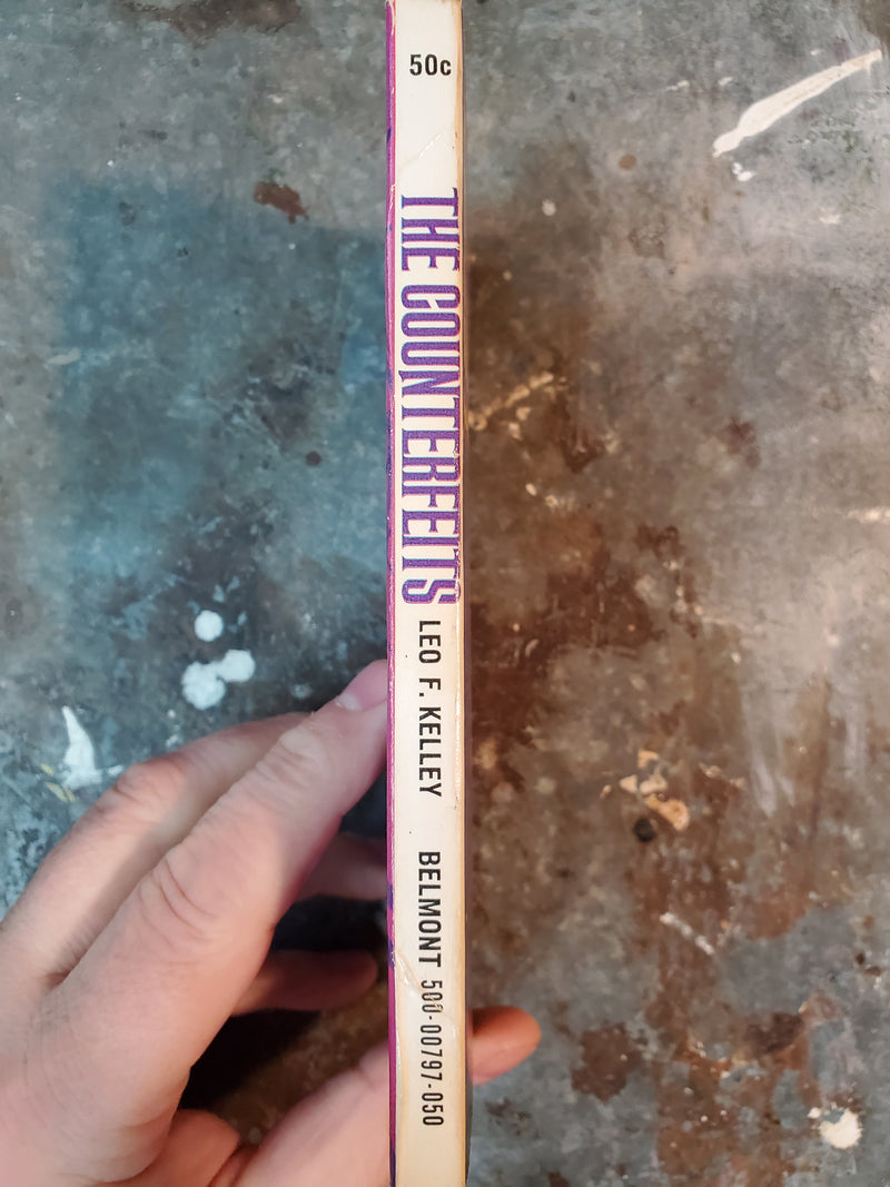 The Counterfeits - Leo F. Kelley