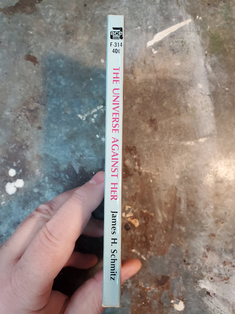 The Universe Against Her - James H. Schmitz