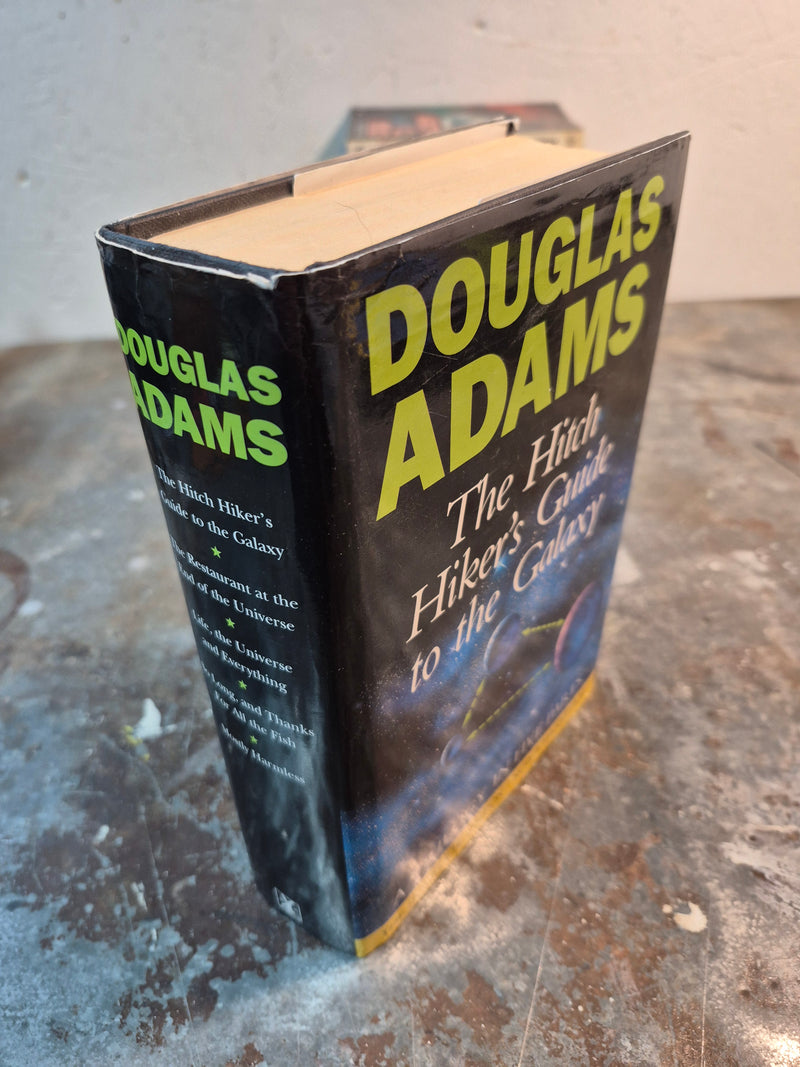The Hitch Hiker's Guide To The Galaxy: A Trilogy In Five Parts - Douglas Adams