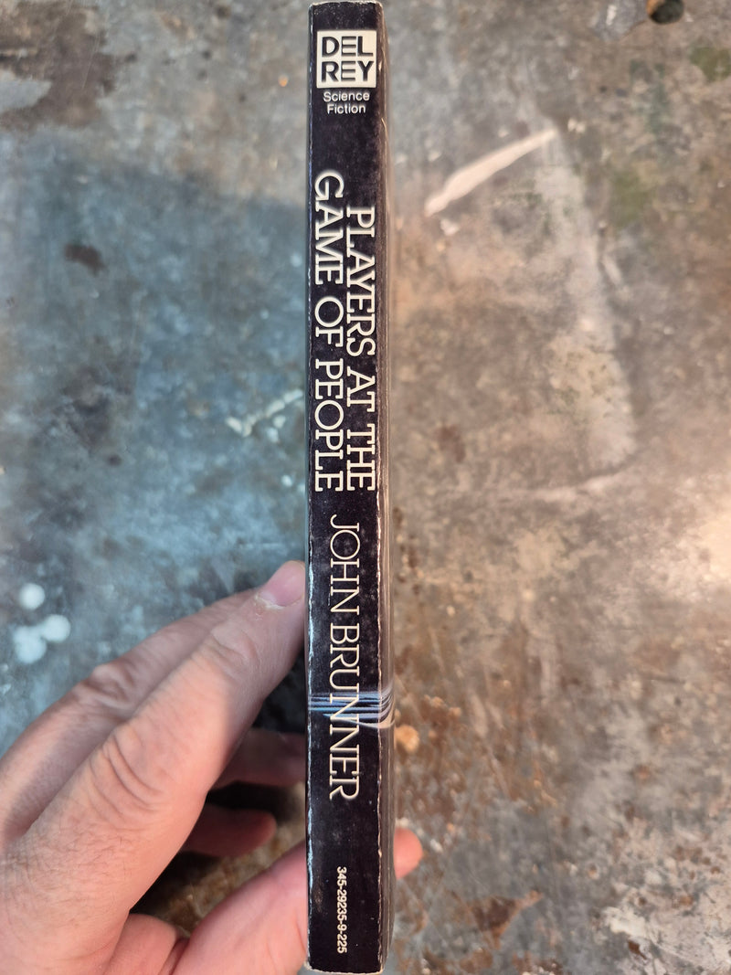 Players At The Game Of People - John Brunner