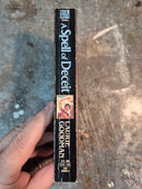 A Spell Of Deceit - Laurie Goodman
